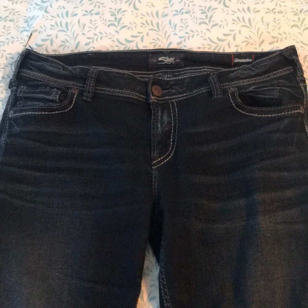 Dark blue straight leg mid rise jeans...worn once!